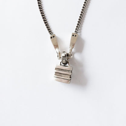 Studded amulet necklace / Lisa Jenks